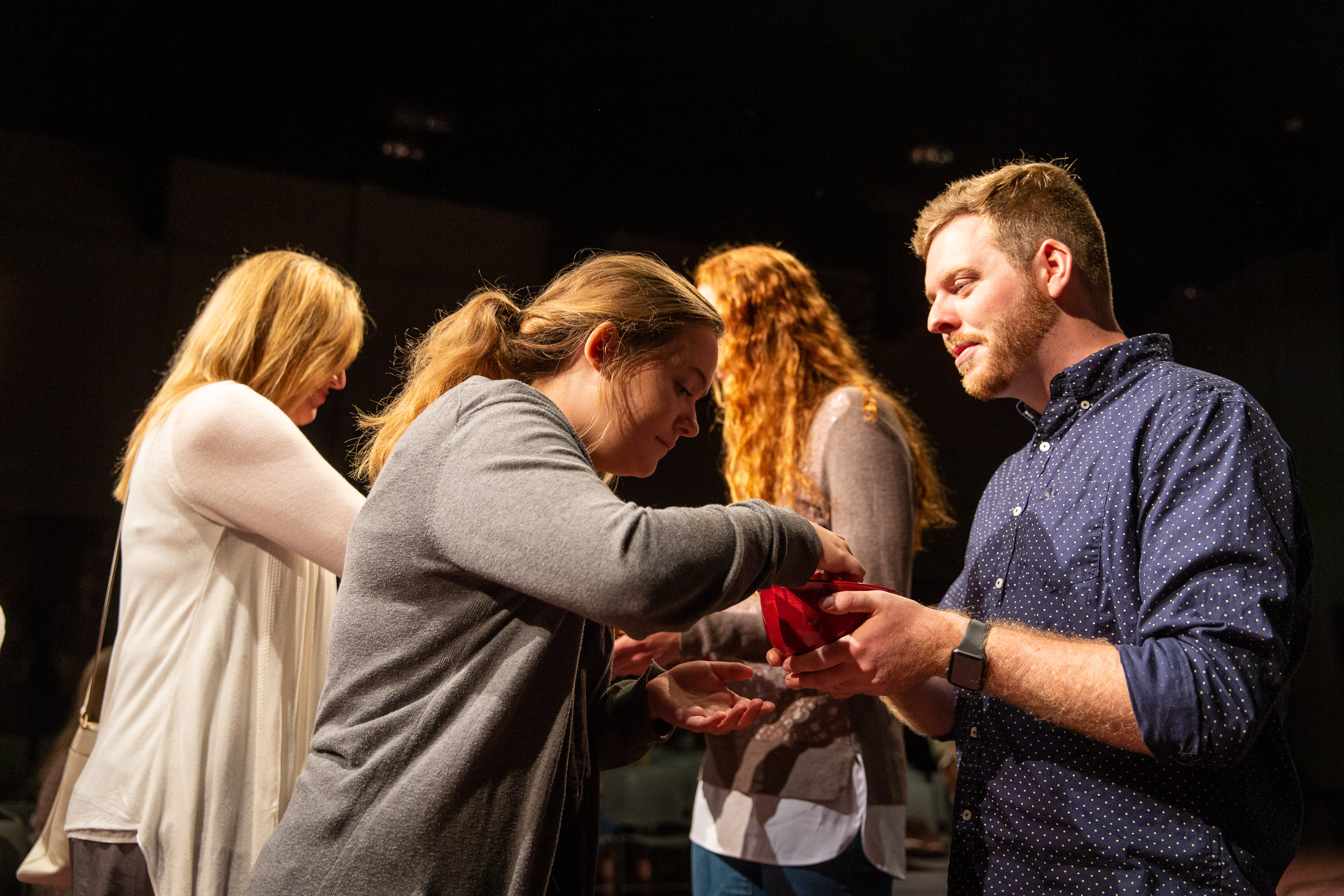 students helping at church