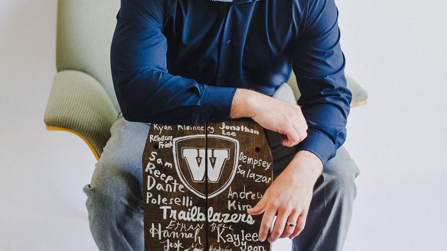 Zak with Trailblazers sign